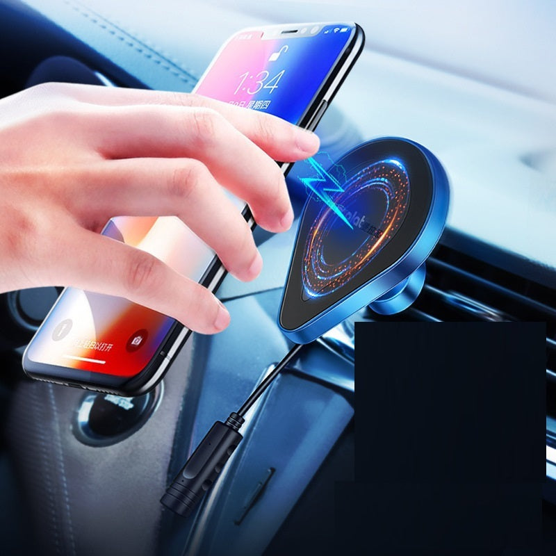 Hand using a blue car phone holder with a smartphone on a dashboard.
