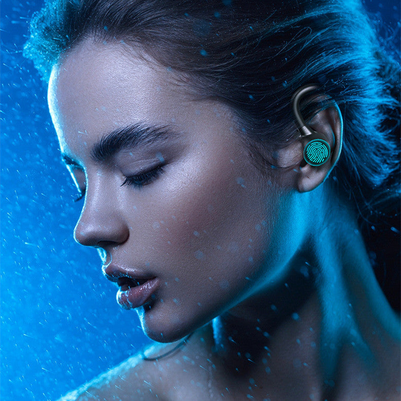 Woman wearing a smart earbud with a blue background